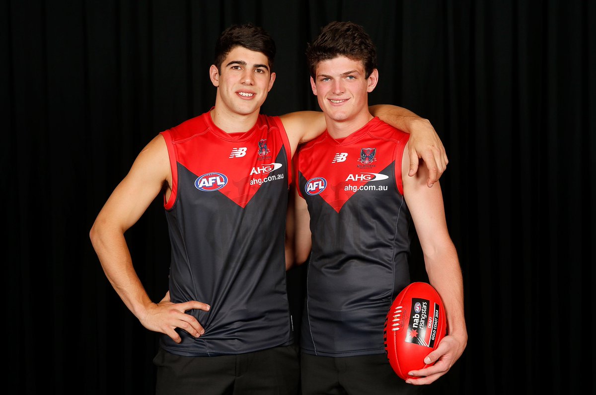 melbournefc's tweet photo. We think the red and blue looks great on @cpetracca7 and @angusbrayshaw_ #myheartbeatstrue #MFCDraft http://t.co/VOlmN73ur5
