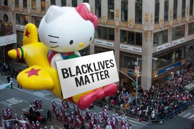 OccupyWallStNYC's tweet photo. #StopTheParade. #BlackLivesMatter. Stand together. #Justice4MikeBrown. End police brutality. http://t.co/9CPCSjxnHl