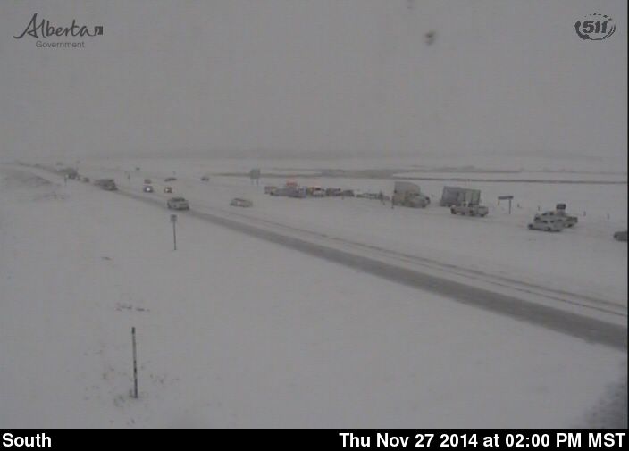 weathernetwork's tweet photo. The QEII through central AB is a mess; RCMP recommending essential travel ONLY: http://t.co/8l2cUTb19h #abstorm