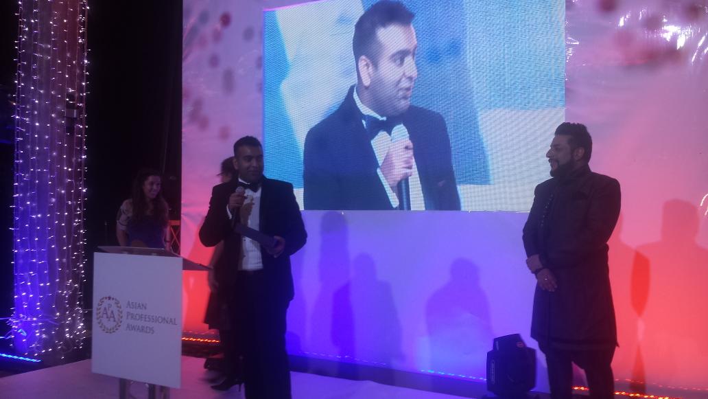 awardsuk's tweet photo. Dipesh Pattni wins the IT and Tech Award #APA2014 http://t.co/ZSRAQ7ynHm