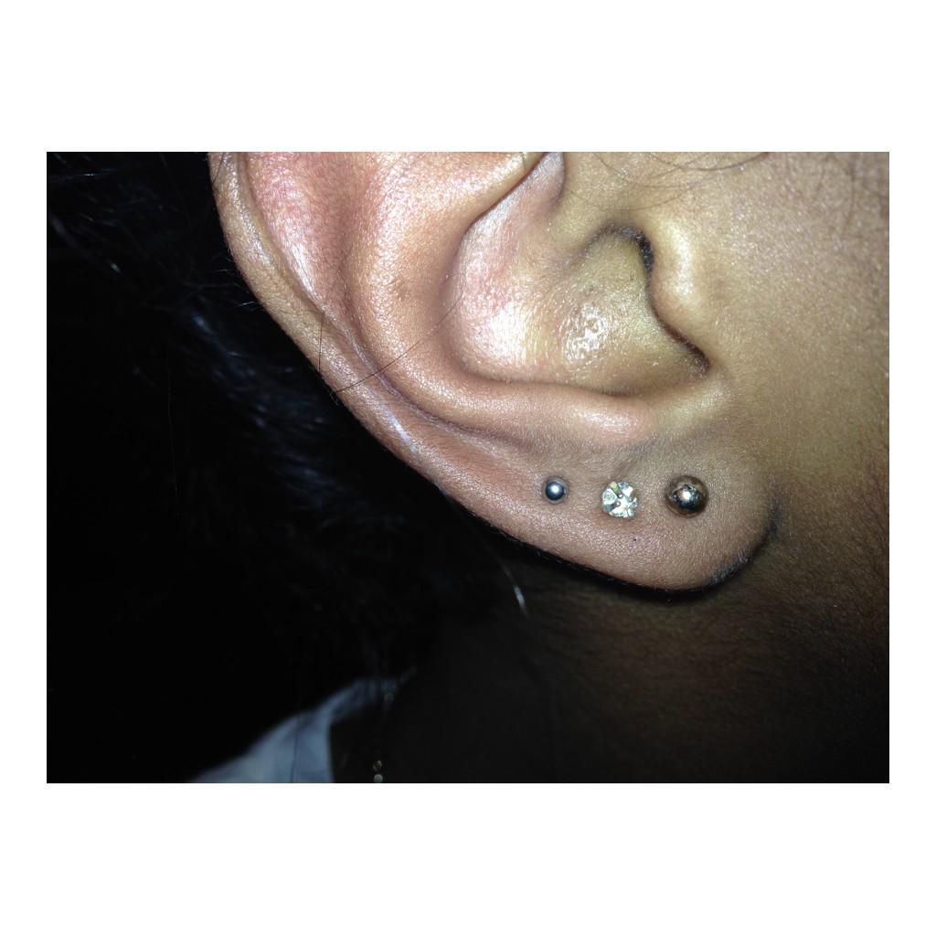 mya_bert's tweet photo. I just pierced my third😱😬😬 http://t.co/058BjpY57C