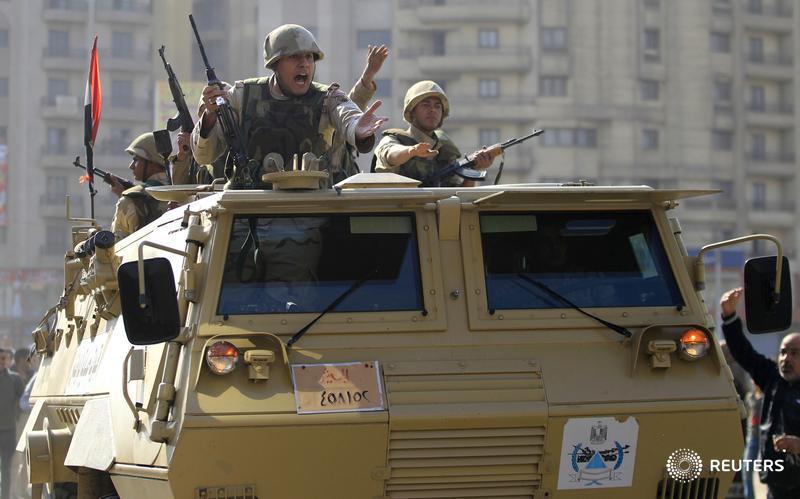 Three people, including army general, killed in attack and Islamist protests in Egypt: reut.rs/1toMaU2