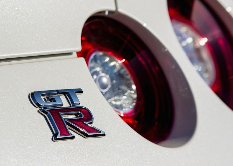 Nissan's tweet image. What's it going to be...the dark side or the light? RT for dark, FAVE for light. #Nissan #GTR #NISMO