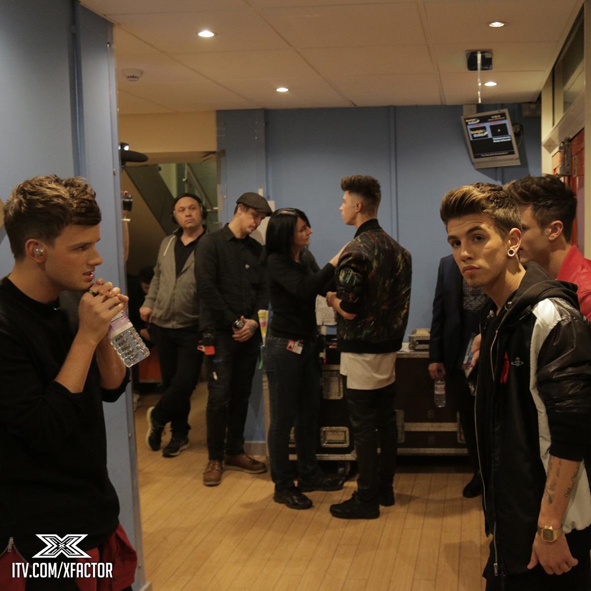 TheXFactor's tweet photo. Those 8 lads gearing up to go onstage! @StereoKicks #XFactorJukebox http://t.co/Qh3AUDcIBh