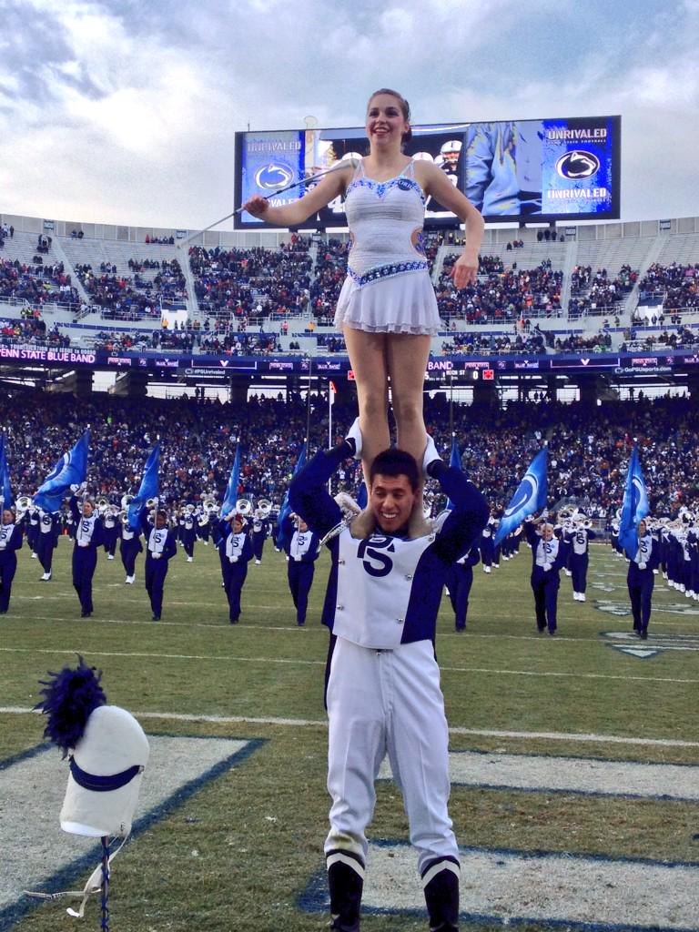 At his final home game, <a href="/PSUBlueBand/">Penn State Blue Band</a> senior drum major <a href="/SiergiejJ/">Siergiej Jebievdenko</a> lifts Blue Sapphire <a href="/Reisspieces/">Daniel Reiss</a>