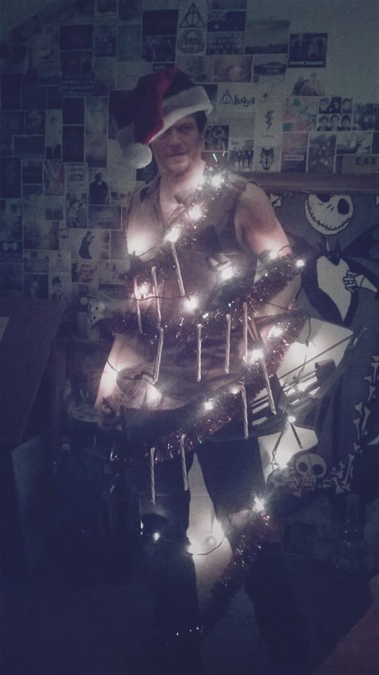 TheFreakinnPope's tweet photo. @wwwbigbaldhead We didn't have room for a tree this year so we decorated Daryl. http://t.co/MVrQP8DVEi