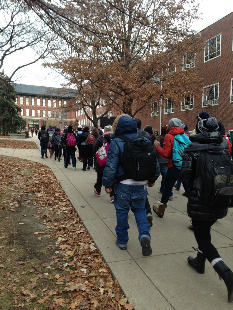 The_Vidette's tweet photo. "Hands up, don't shoot," students protest on their march #FergusonMatters http://t.co/ZzSVqzuure