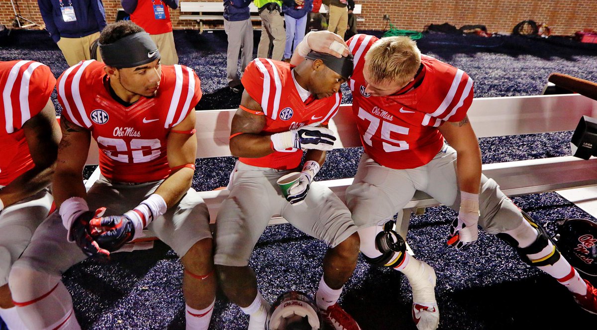 OleMissPix's tweet photo. Missed this pic the 1st time. Walton and Conyers after the big run during Saturday’s Egg Bowl. @OleMissFB http://t.co/NMdFRa7baM