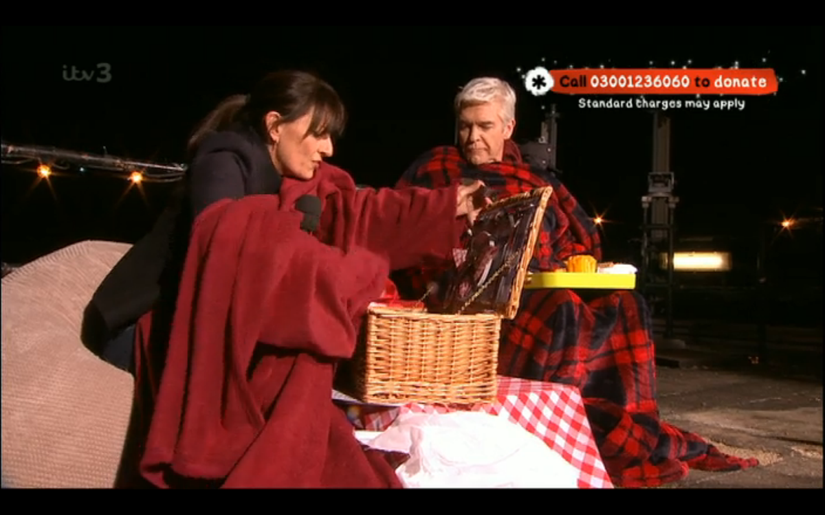 ITV's tweet photo. Don't go to bed yet, @Schofe &amp; @ThisisDavina are having a midnight feast on the roof of ITV Towers! #TextSanta24 http://t.co/LeApaLp7h8