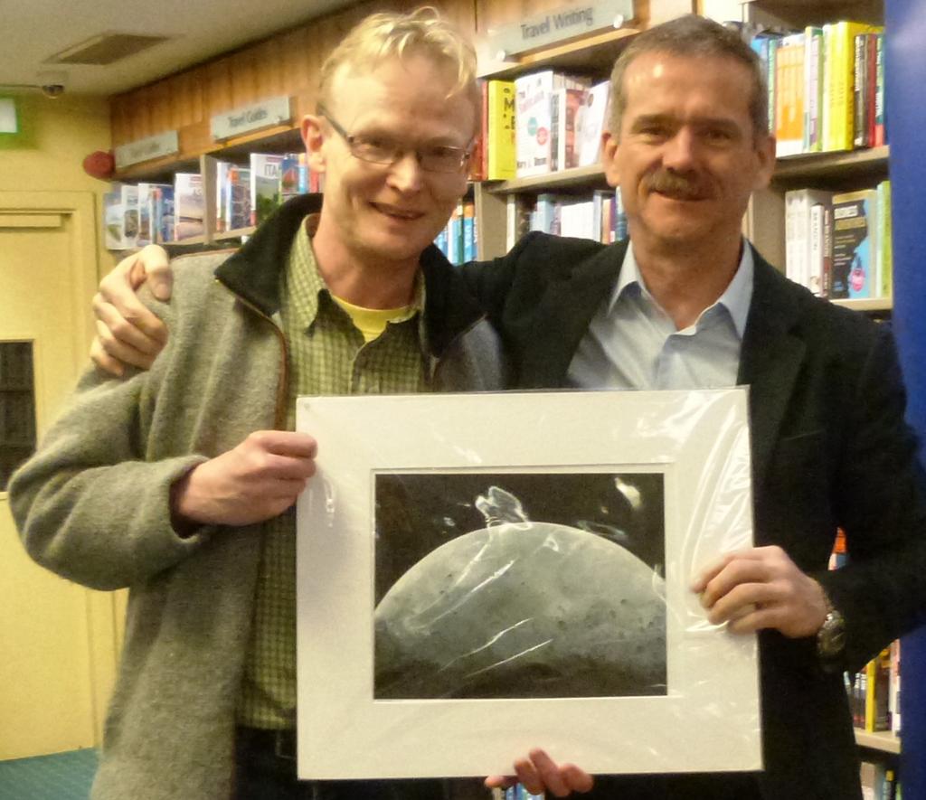 BallaBanArt's tweet photo. Was over the moon to meet @Cmdr_Hadfield today & present him with early Christmas gift of my moon artwork #frankodea http://t.co/oSwTrVj0mH