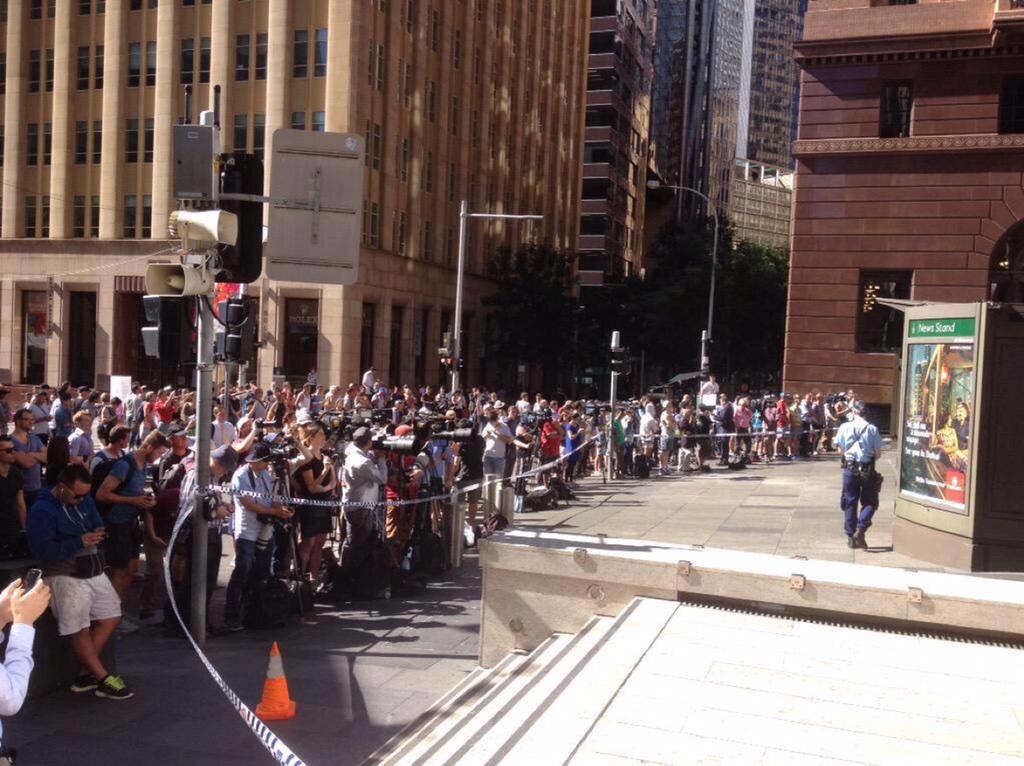 This is the world we now live in. Literally metres from the Cafe with phones &amp; cameras out. #sydneysiege