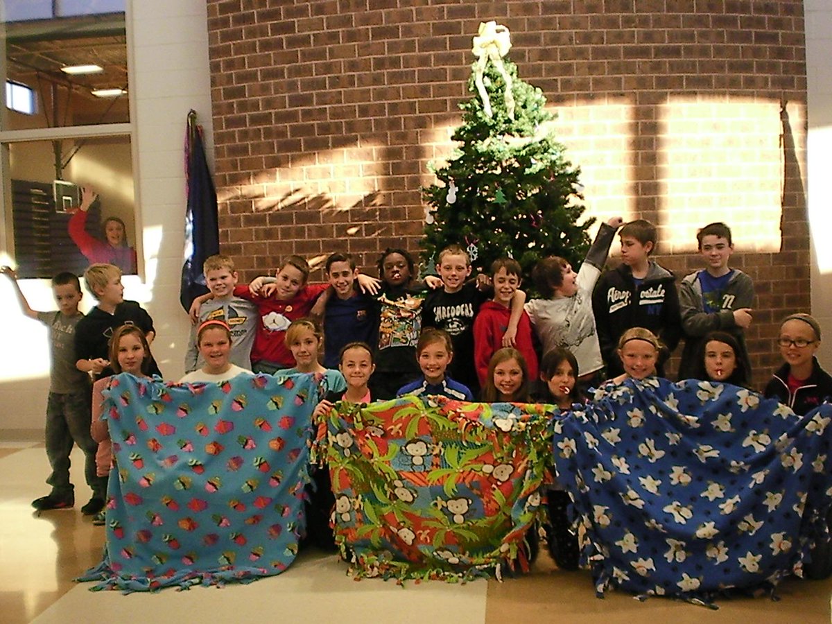 The 5th grade classes made blankets for needy families with Mrs. Burrough.
