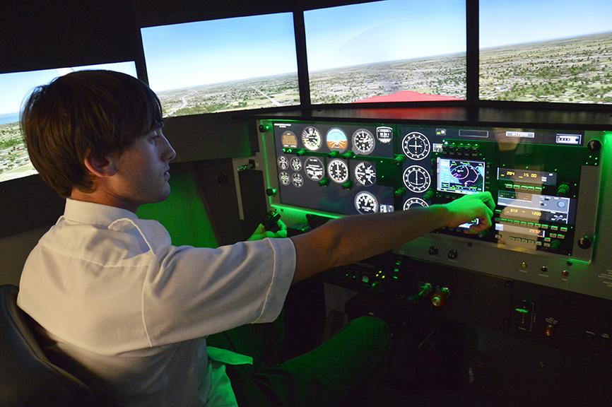 AcademyLI's tweet photo. Our #AviationProPilot Students @BixhornTech pose with the new @Redbird_Flight Simulator.Getting ready to fly- 4 real! http://t.co/3KV0a9DTTJ