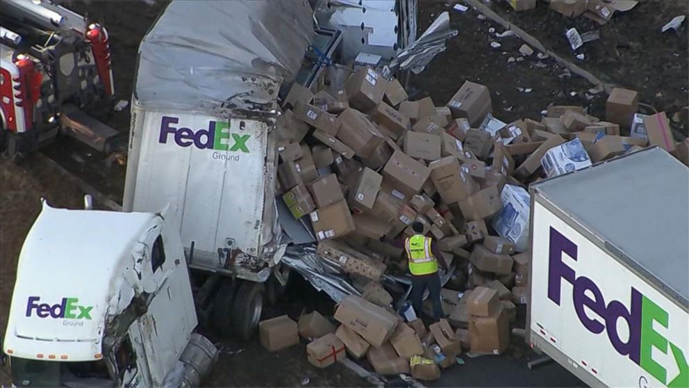 ABC's tweet photo. FedEx truck crashes, sending packages flying 10 days before Christmas: http://t.co/WTtVCTBDjx http://t.co/FCRCl0Paej