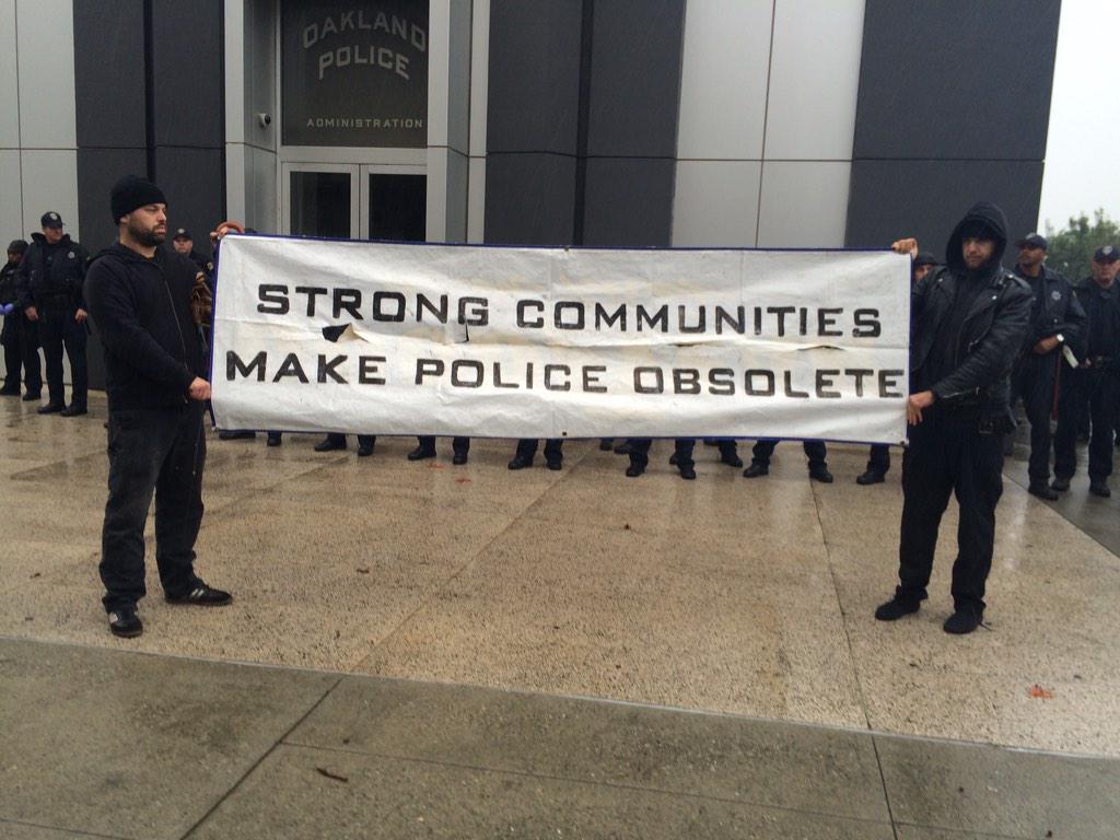 BlackOut Collective in California blockade the Oakland Police department with abolitionist messaging