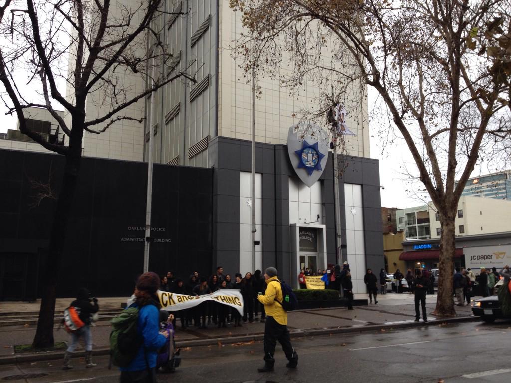 CalProgressives's tweet photo. Asians4blacklives held down the front door, but recently arrested- cited and released #shutdownOPD #EndTheWar http://t.co/l2GSwOfJ94