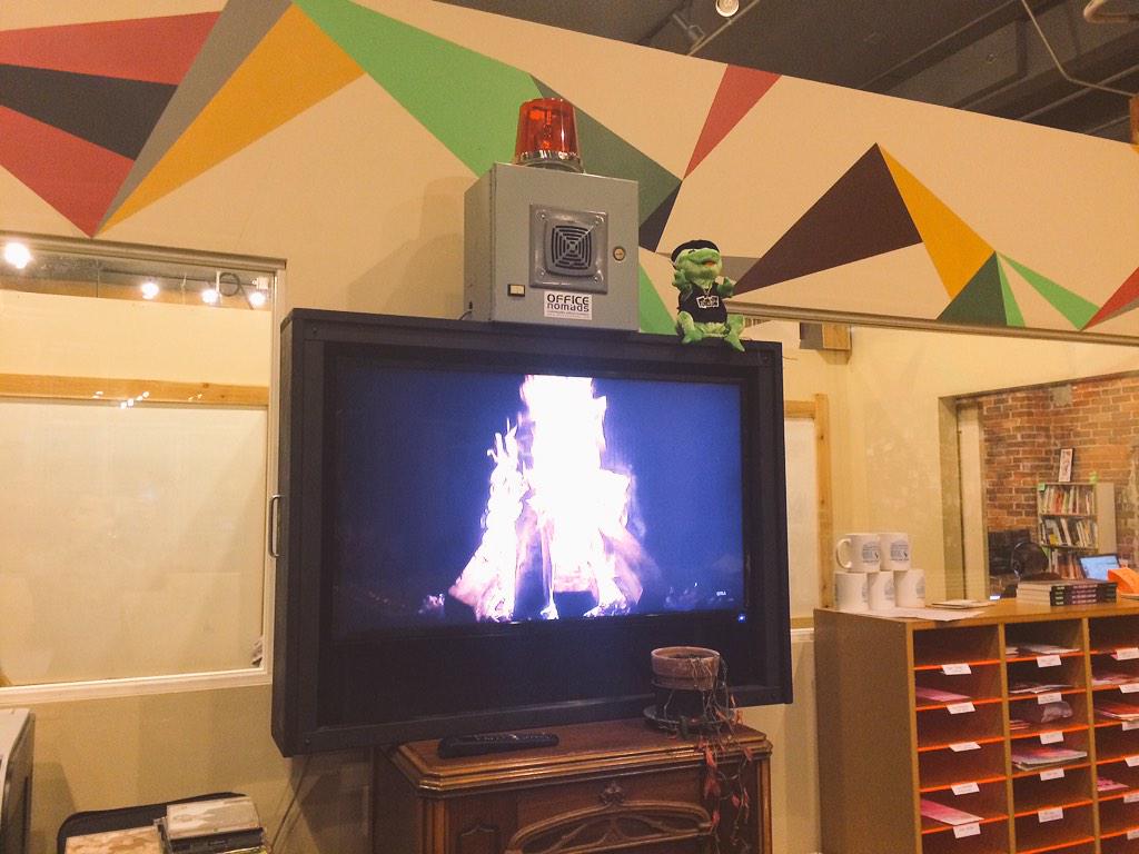 officenomads's tweet photo. And there you have it, folks. The Yule Log burns bright at the office! #falalalala http://t.co/pVfrwwqhIf