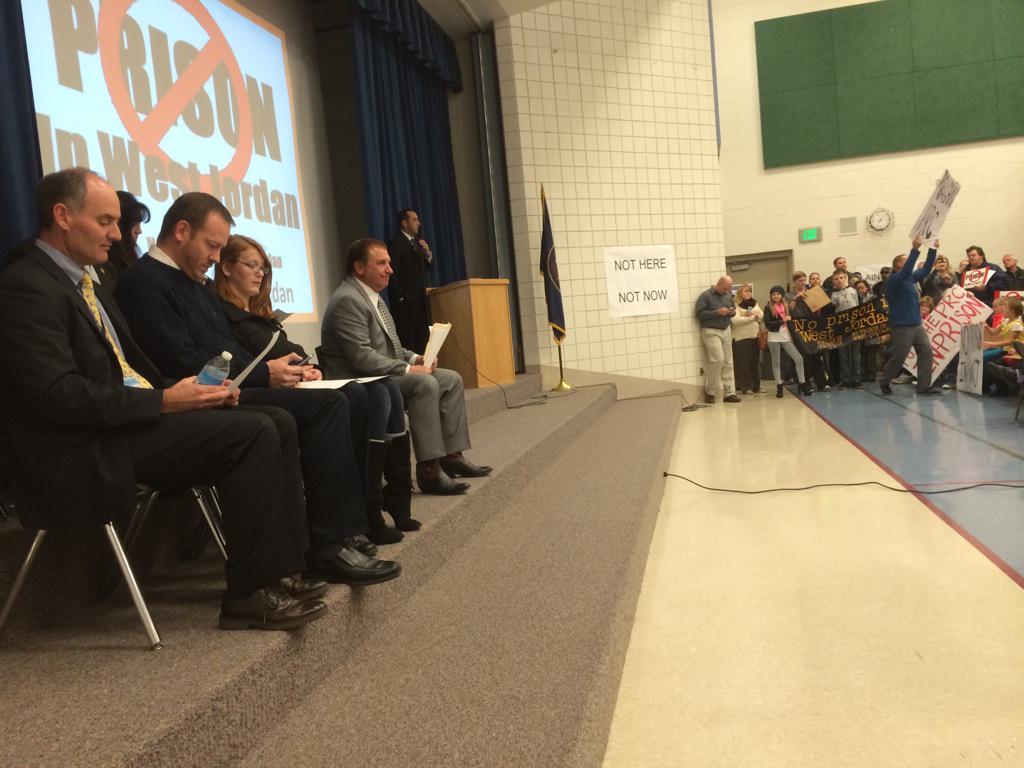 danielmwoodruff's tweet photo. Meeting is underway. Speaker asks audience to use hashtag #NoPrisonInWestJordan. Says they want this to go viral. http://t.co/WfU5rVCuNx