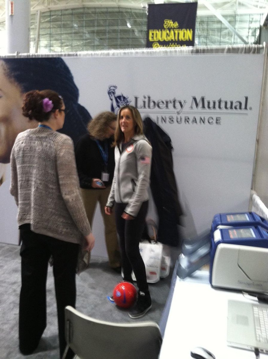 As a soccer fan I'm stoked. Brandi Chastain is two booths away from me taking pictures with people!
