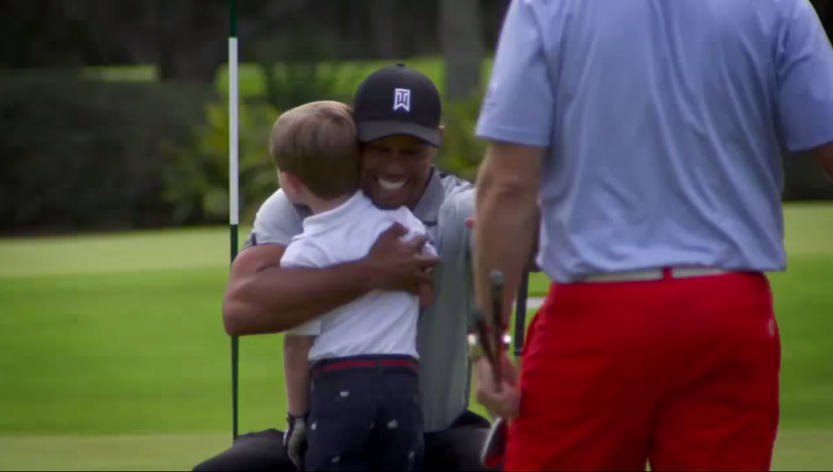 GolfDigest's tweet photo. Tiger made this boy's dreams come true: http://t.co/feLZRLkx3W http://t.co/xPFaEyVl5Q