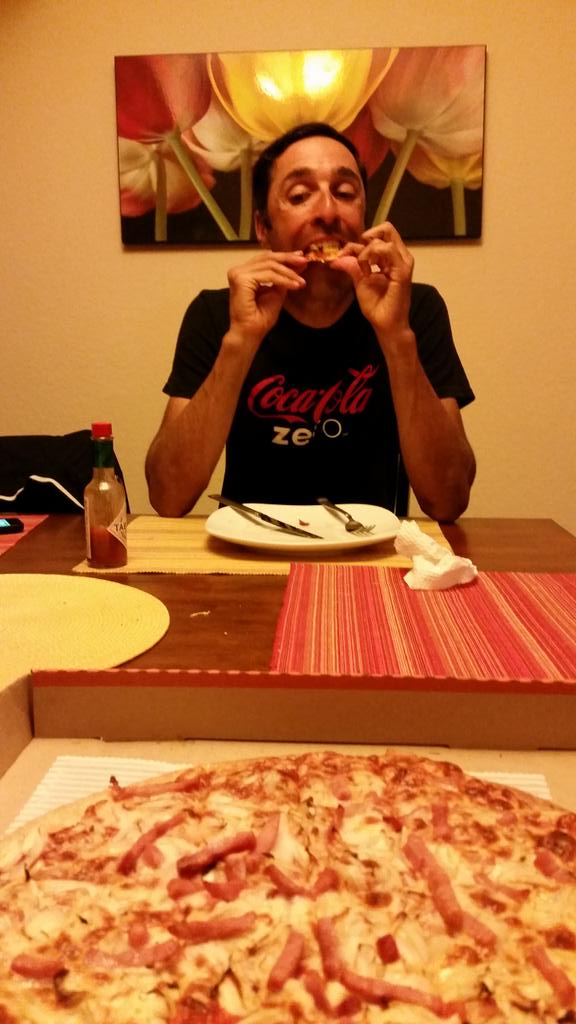 After long ride, champs eat pizza/@daltonfayad