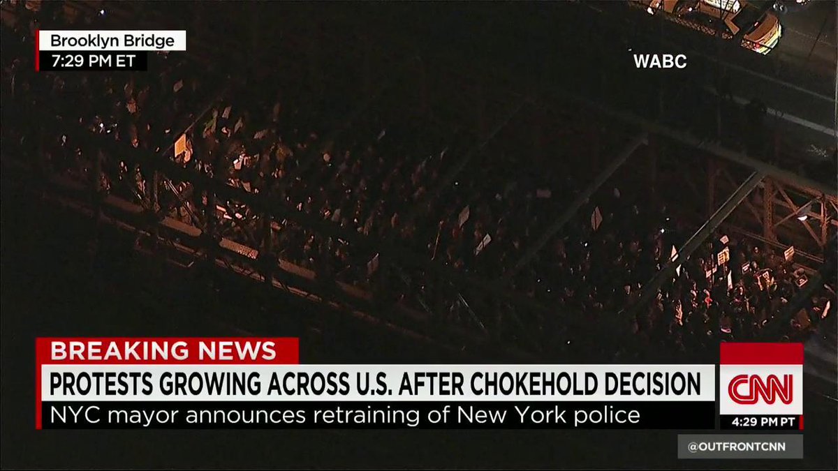 OutFrontCNN's tweet photo. Protesters making their way across the NYC's Brooklyn Bridge over #EricGarner decision. @BrookeBCNN has more. @CNN http://t.co/t3qwA5M3Bp