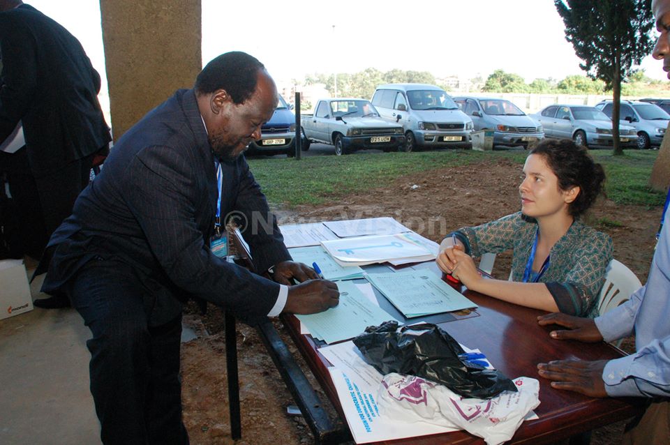 newvisionwire's tweet photo. #Photo: Ogenga Latigo registering...
#FDCDelegates Conference is on at Namboole stadium http://t.co/0Ih9syFcHU