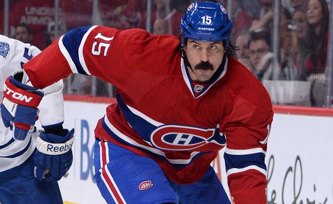 SportsCentre's tweet photo. .@GeorgeParros retires from the #NHL after nine seasons. In 474 games, he had 18 goals, 18 assists &amp; 1,092 PIM #TSN http://t.co/NHpbrRa8JU