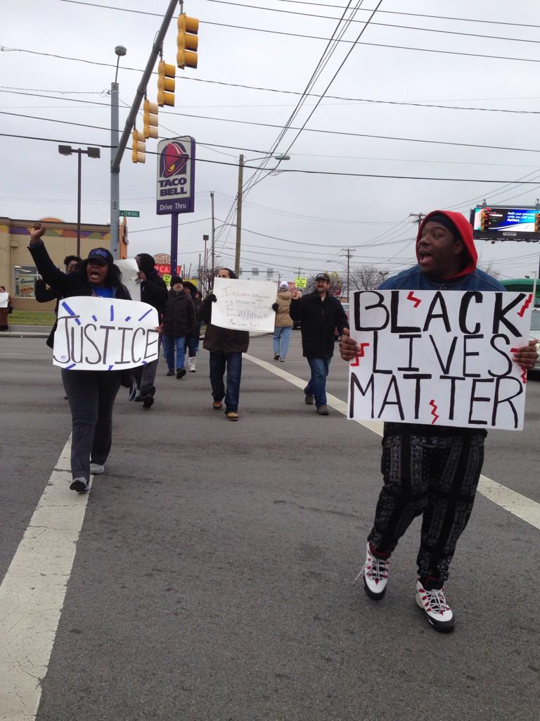 woke_and_broke's tweet photo. Hands up, don't shoot. #toledo #protestpolicebrutality http://t.co/zCkBbuYJNj