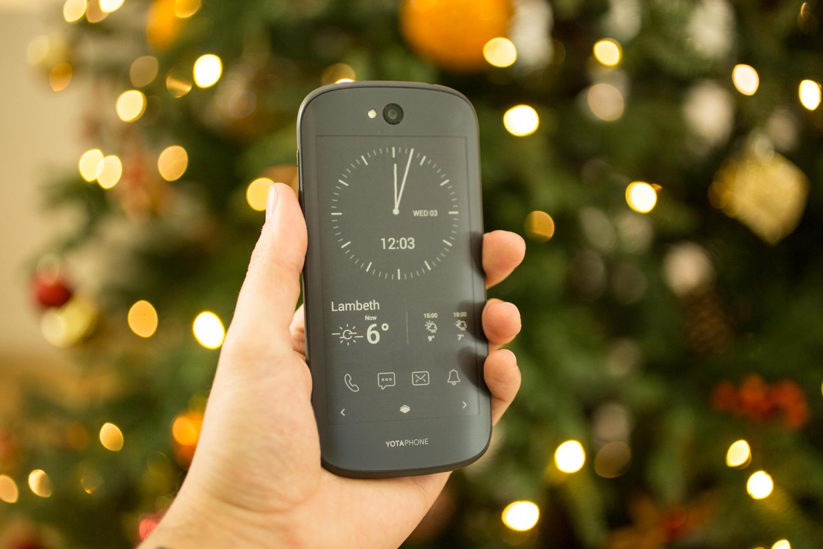 CNET's tweet photo. YotaPhone 2 review: A novel e-ink screen on the back of the phone but it comes at a high price http://t.co/V1kj9LA3pU http://t.co/HDZdgWTPll