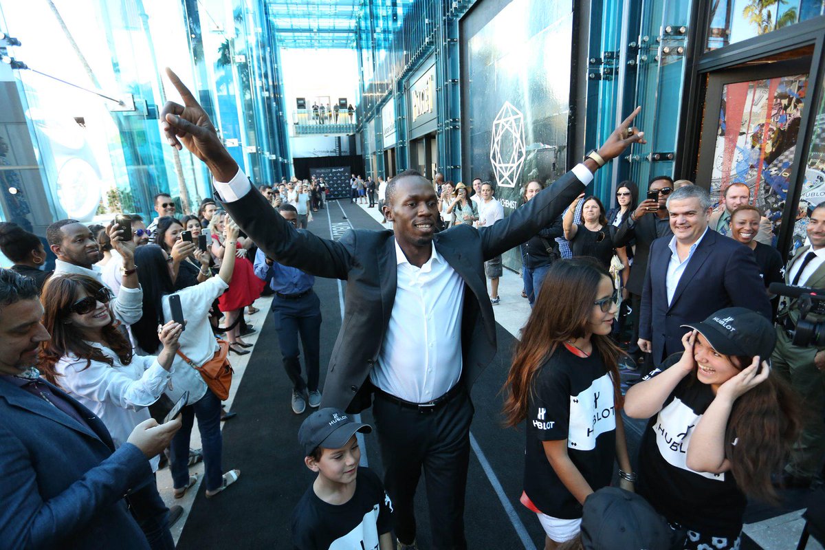 usainbolt's tweet photo. Epic @Hublot: Fastest @usainbolt crosses the finish line marking the opening of the 11th @Hublot boutique in USA! http://t.co/PN9DjBbIgf”
