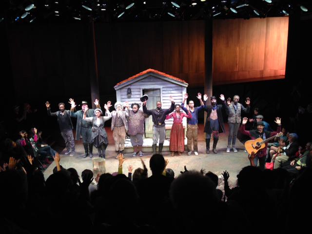 The cast from Father Comes Home with their hands up.  Yes.