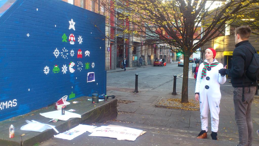 PigeonAngel's tweet photo. An elf finishing xmas #streetart designs #nqxmas http://t.co/gOq3BWgjvg