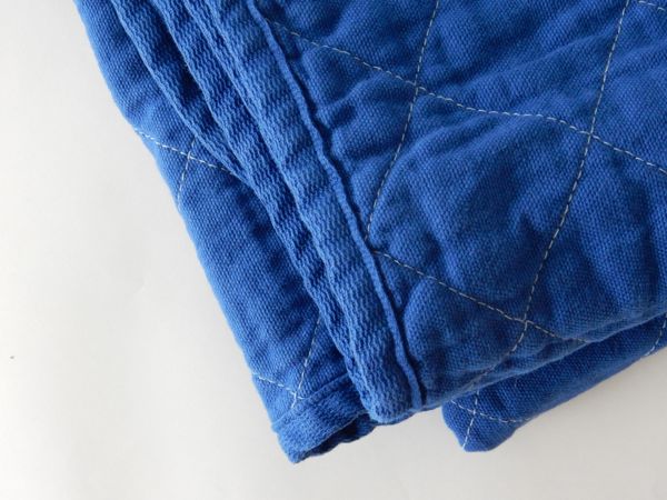 antiqueshow's tweet photo. 季節色とは裏腹にIndigoが人気。
鮮やかな青とキルト加工のUSED感。
たまりません。
#Indigo #blue #utilitycanvas 
#Throw #blanket #outdoor #NYC http://t.co/V8DR0WgmWT