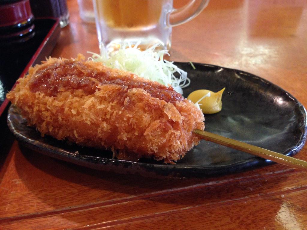 平塚グリーンサウナの肉豆腐と串カツ。