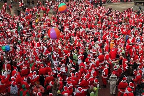 bucketify's tweet photo. Santa Clauses descend on London for #Santacon2014 http://t.co/Ehe9XrmRPd