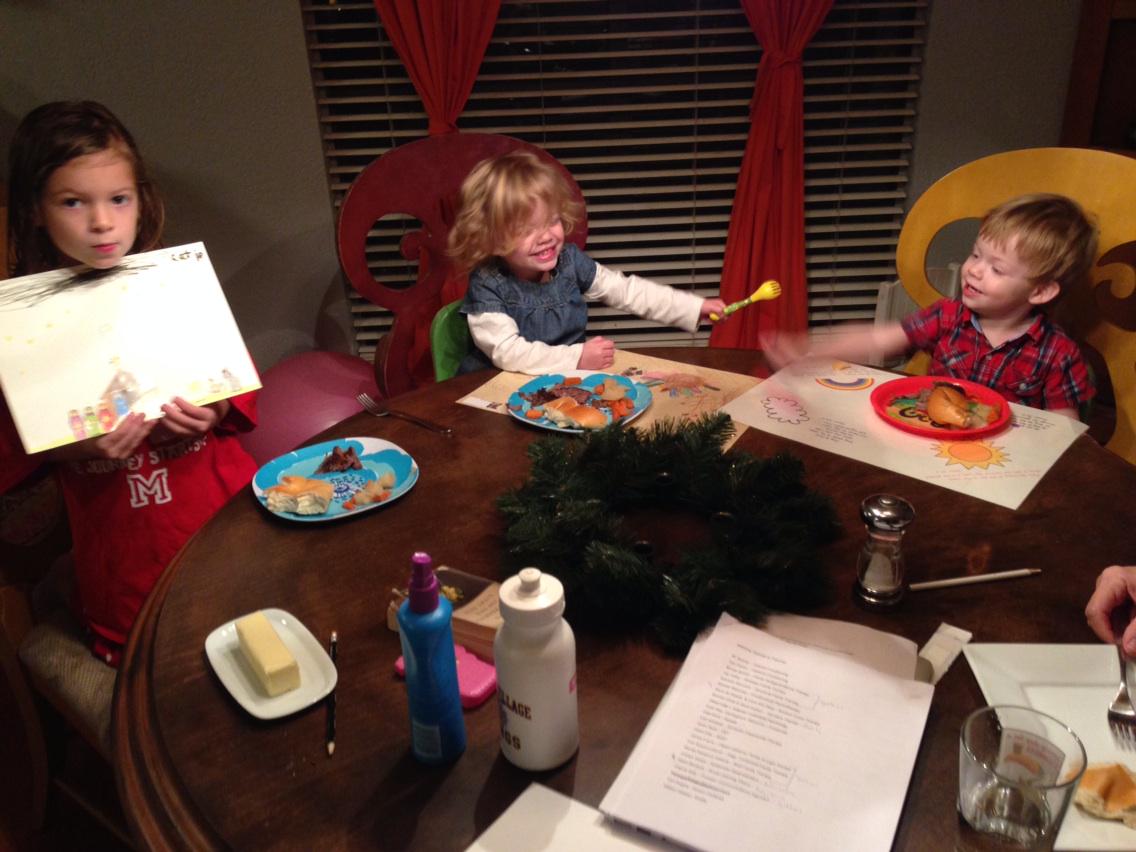 MattTonne's tweet photo. Advent devotional tonight: twins sword fighting over dinner while Katie shows off her LV picture today. http://t.co/fmLB1H6tZ4