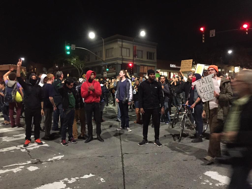 At University and MLK "from ferguson to Berkeley we won't back down" heading south now  #berkeleyprotests