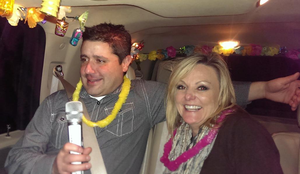 UberRedXL's tweet photo. This couple came out of El Gaucho and sang Closer to you #TheCarpenters and got lei'd in the #AlohaUber #loveinanUber http://t.co/js84uC8tWK