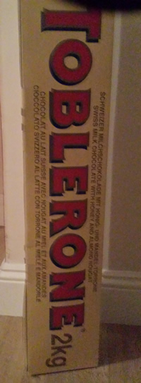 EstateAppsUK's tweet photo. The guys in the office are #WolfingDown the giant #Tolberone with surprising ease! :-) #WishWeHadTwoNow #Chocoholics http://t.co/WUG8GVl5SC