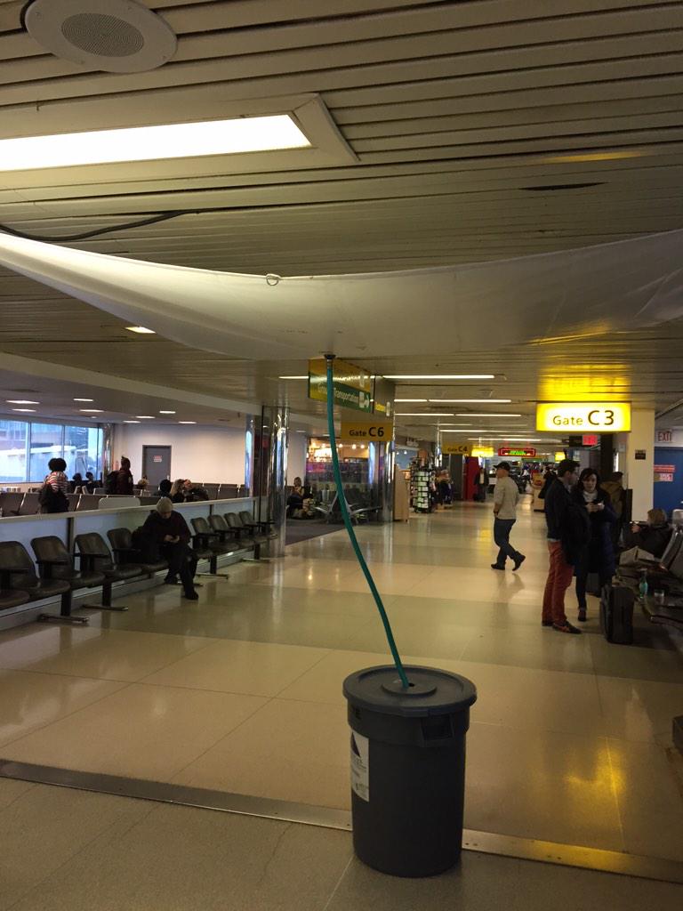 thebadvillain's tweet image. @united your terminal at @LGA is looking professional.  #raininginside #nottemporary
