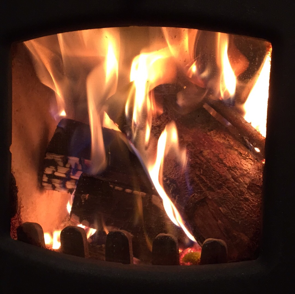 mikerhodes's tweet photo. .@rosechild is getting rather good at making fire in the wood burner http://t.co/cjwewLo5pA