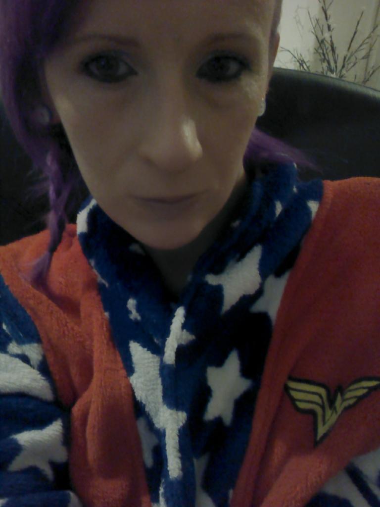 Veganhempress's tweet photo. I basically live in this wonder women dressing gown #whyimalone http://t.co/YN5T56GO6z