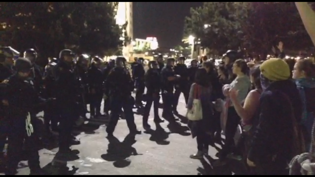 NewsRevo's tweet photo. Part of the #berkeleyprotests appear Kettled | LIVE http://t.co/262eVoUVhF #Berkeley http://t.co/dfgt0bhXv5