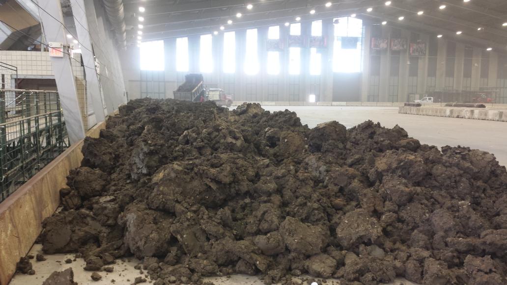 cbnationals's tweet photo. The first loads of clay have hit the floor of the River Spirit Expo Center. http://t.co/8p4TXVQ2o0