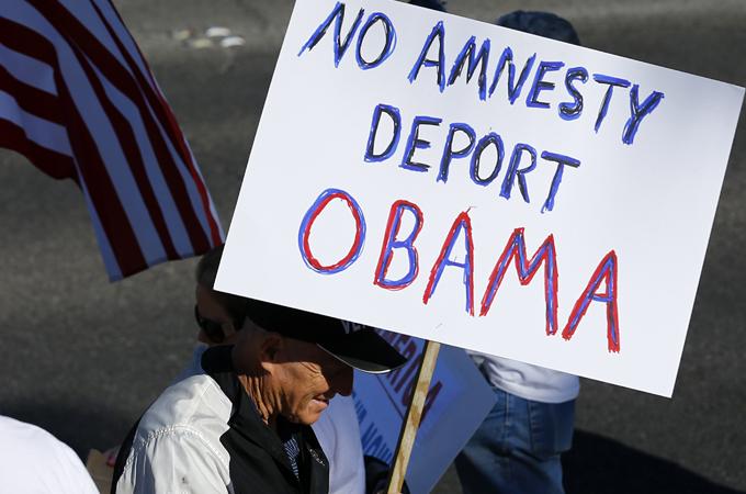 AJEnglish's tweet photo. "We want to maintain the integrity or our country" #Immigration debate rages on in #US. http://t.co/D9rhETdgpj http://t.co/PJUlS3hYdF