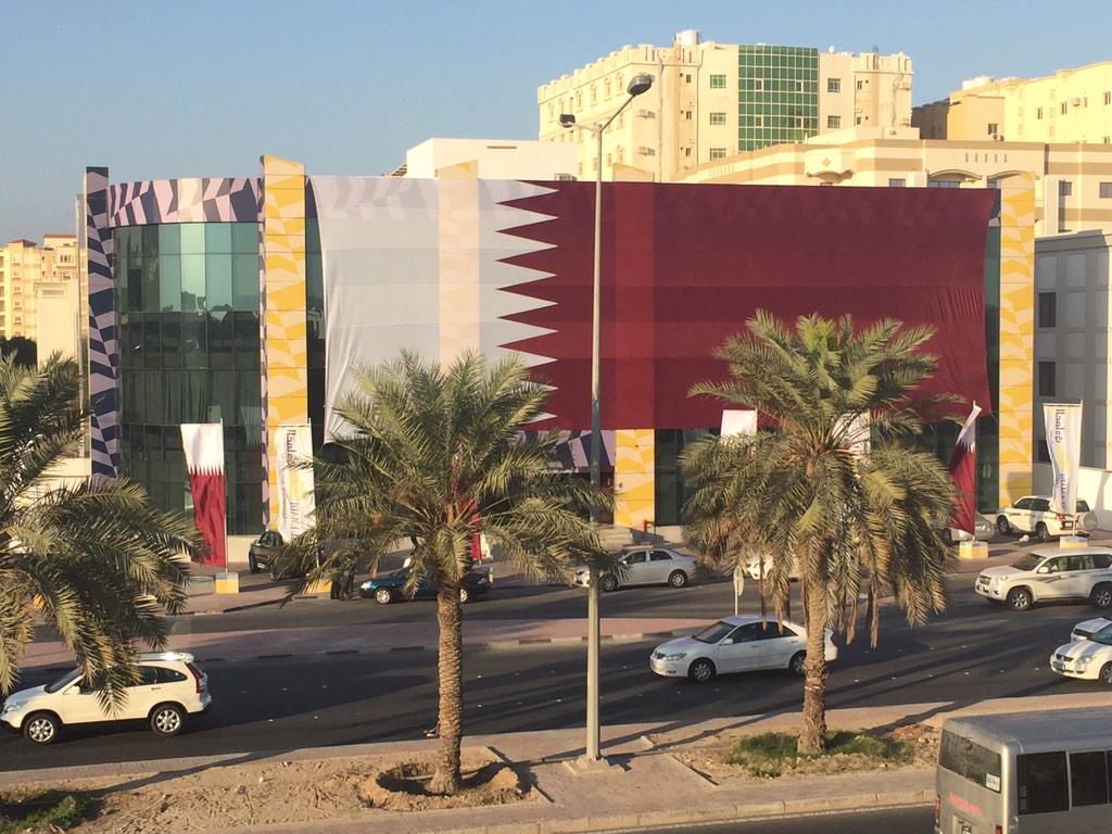 diab_ola's tweet photo. Largest Qatari flag I've seen thus far! #QND2014 #Doha #Qatar #AlEmadi http://t.co/s82hX8aT9c