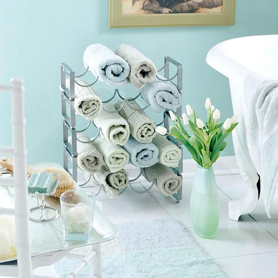 MendABath's tweet photo. #BathroomTip :Do you store your towls in plain sight? Role them up and put them in a wine rack for a better look! http://t.co/OI50jKPfJE