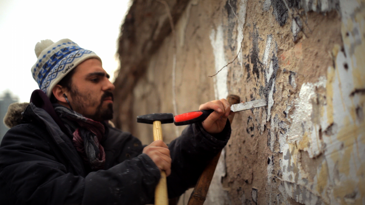 Cranetv's tweet photo. WATCH: @U2 collaborator @vhils1 chipping away at #lisboa's secrets #FilmsOfInnocence http://t.co/gXgAp60ulx http://t.co/fAJw1cgbdn
