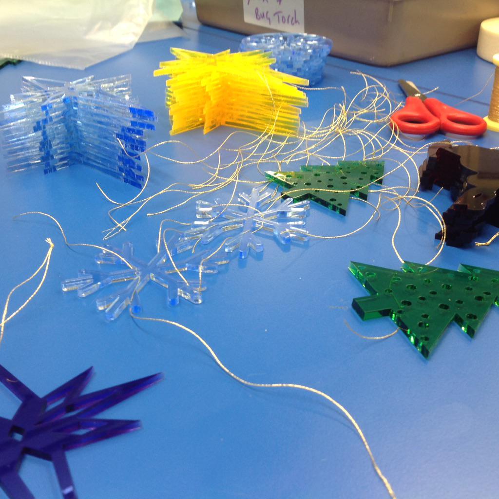 capeenterprise's tweet photo. threading the decorations http://t.co/6ZAnIIyXA7